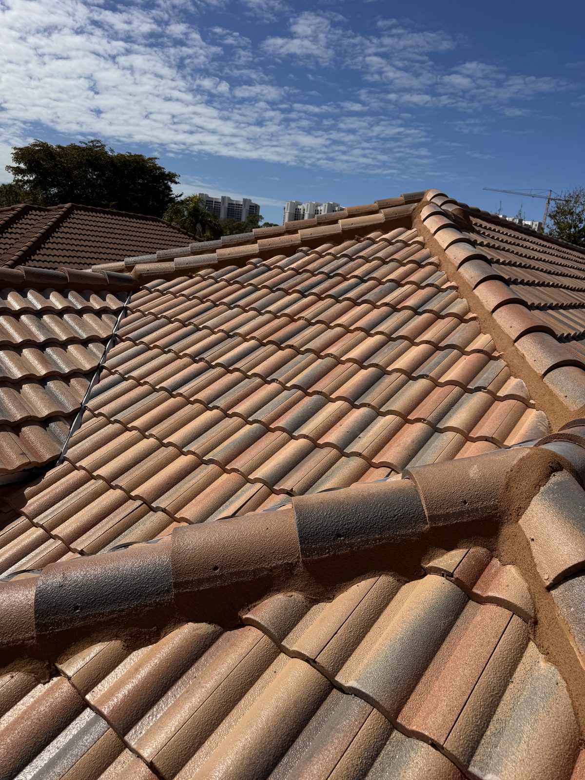 Completed concrete tile reroof installed by Anchor Construction Group in Southwest Florida